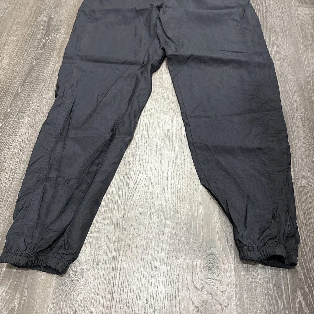 VTG Reebok Mens Track Pants Black Size Medium Elastic Waist Drawstring Nylon Zip